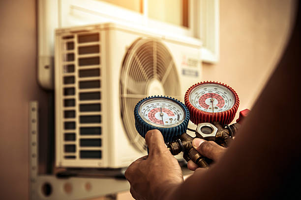 Professional Hvac technician working in Harrisonville, MO